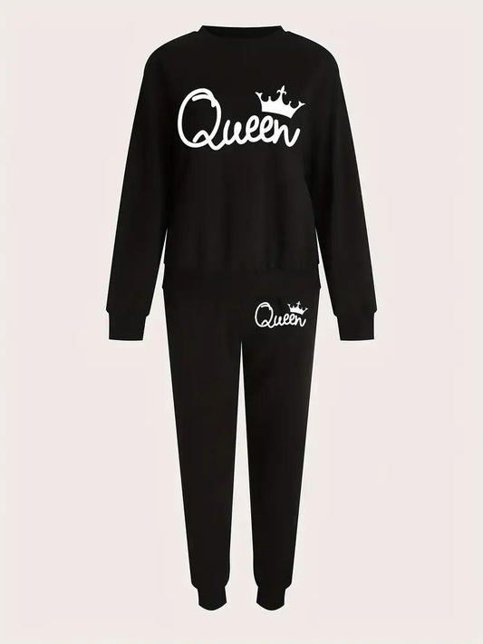 Black onesie with 'Queen' text on a beige background
