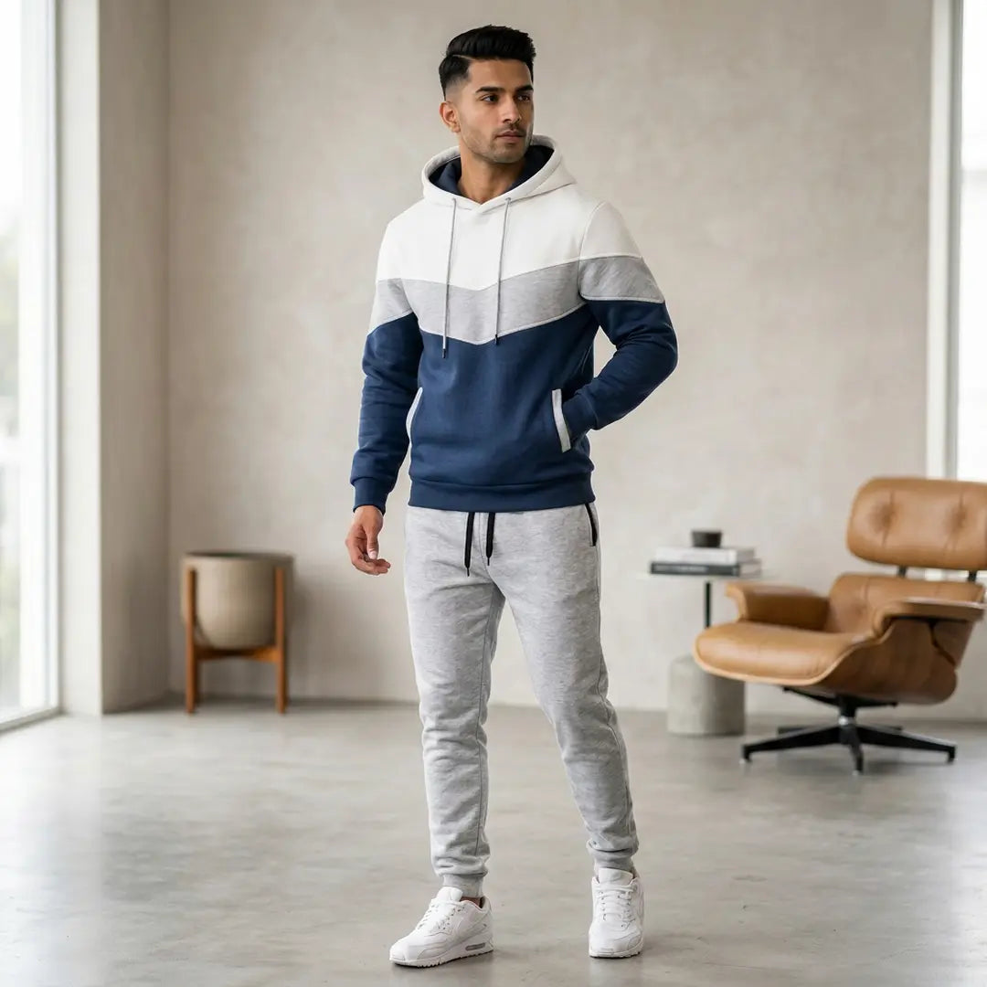 men standing wearing white blue hoodie with white sweatpants