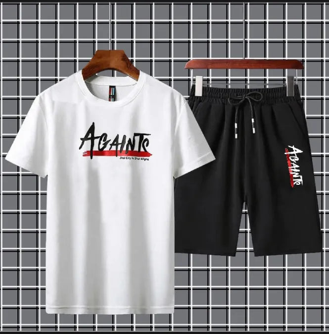 White t-shirt and black shorts with 'AGAINST' branding on a grid background
